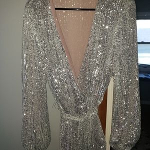 Silver Sequins  wrap dress with nude inner lining. Dress was never worn. Nwot